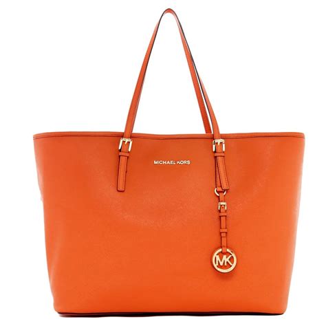 michael kors burnt orange large jet set tote|michael kors jet set luggage.